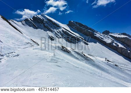 La Clusaz, France - 20 April 2017 : A Ski Slope On A Snowy Mountain Completely Abandoned At A Clear 