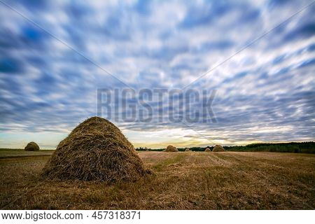A Big Haycock Stands In The Field