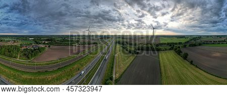 Brecht, Belgium, 16th Of May, 2022, Panoramic Aerial Drone View Of Wind Farm Or Wind Park, With High