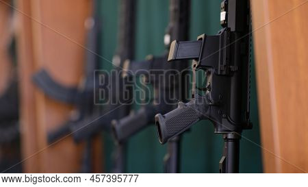 Rifles Or Air Rifles On A Rack Are For Sale. Weapons For Police Concept