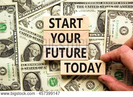 Start Your Future Today Symbol. Concept Words Start Your Future Today On Blocks. Businessman Hand. B