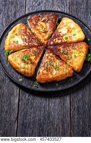 Potato Farls, Irish Potato Cakes, Potato Bread On Black Plate On Dark Wooden Table, Vertical View Fr