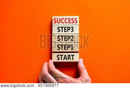 Strat, Step And Success Symbol. Concept Words Start Step 1 2 3 Success On Wooden Blocks On A Beautif