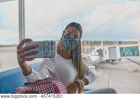 Caracas, Venezuela - 2022: Young Woman Waiting To Board The Plane In The Lounge The Simon Bolivar Ai
