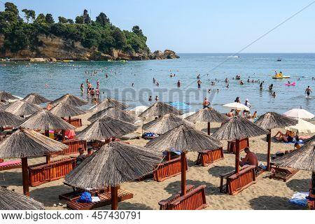Ulcinj, Montenegro - June 4, 2022: Tourists On The Municipal Beach In Ulcinj. Ulcinj Is The Southern