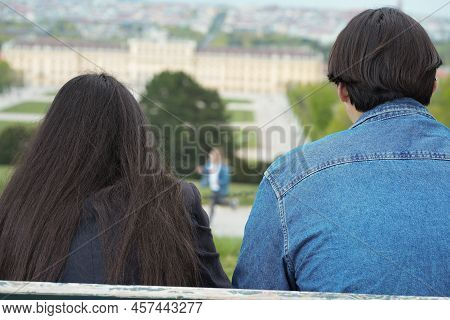 Friends Looking At A Castle From A Hill