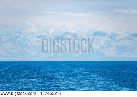Massive Mountains In Alaska Are Lost In The Mist As Cruise Ship Sails From Coast Around Yakutat