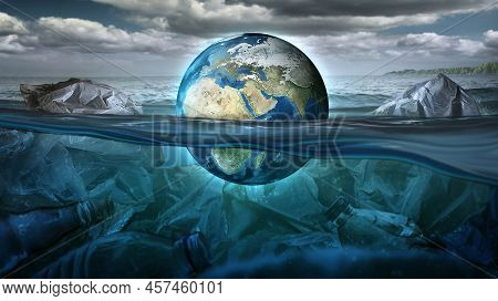 The Earth Floats In The Sea Full Of Garbage And Pollution. Environment Concept. Earth Image Provided
