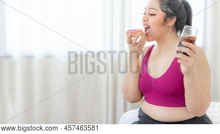 Portrait Beautiful Plump Young Asian Woman Joy Of Eating Junk Food Sweet Treat Cake And Sweet Water 