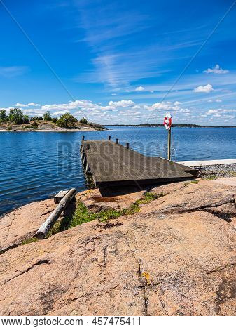 Landscape With Rocks And Landing Stage On The Island Sladö In Sweden.