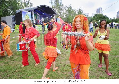 MOSCOW - AUGUST 18: Musicians in bright costumes at festival Ekofest 2012 on banks of Stroginsky gulf, on August 18, 2012 in Moscow, Russia.
