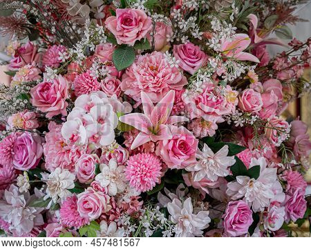 Big Bouquet Of Flowers In A Vase On A Gray Wall Background