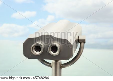 Metal Tower Viewer Installed Near Sea. Mounted Binoculars