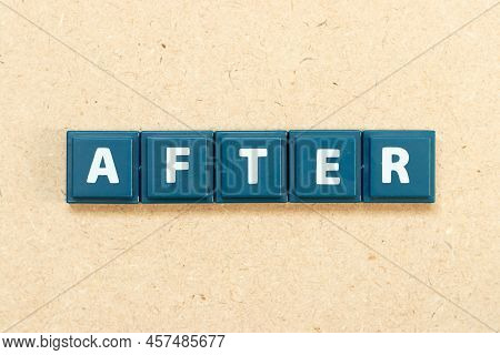 Tile Alphabet Letter In Word After On Wood Background