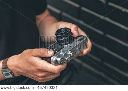 Close-up, Vintage Film Retro Camera In Male Hands.