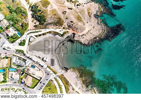 Playa De Cala Mosca Seaside With Turquoise Mediterranean Sea During Sunny Summer Day, Province Of Al