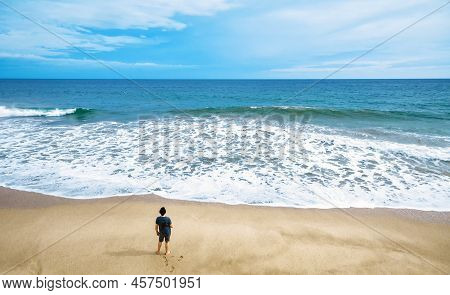 Deserted Beach And Lone Watching Man, Person Stands Alone On Sea Sand Shore, Melancholic Loner Vs Oc