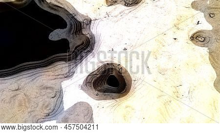 Light Brown Abstraction From Different Spots. Between The Light Brown Spots One Large White Spot And