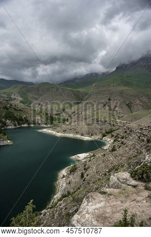 Caucasian Mountains And Lake Gizhgit In Russia In Spring