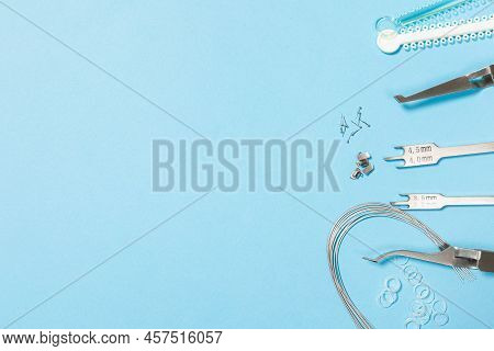 A Set Of Special Tools For An Orthodontist To Install Braces For A Patient. Orthodontic Arcs, Ligatu