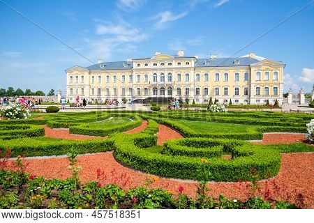 Rundale, Latvia - July 2, 202 - The Rundale Palace With The Castle Garden. Defocused