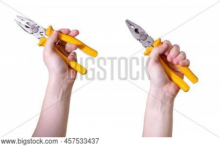 The Man's Hand Is Holding Yellow Pliers Insulated Against A White Background.