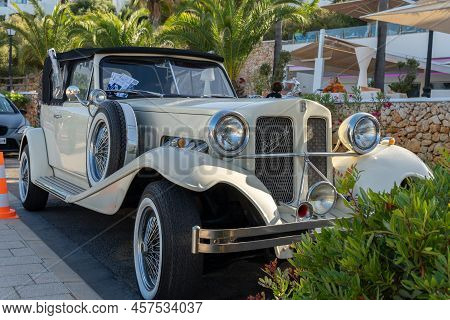 Cala D'or, Spain; June 25 2022: Vintage White Beauford Car, Parked In The Luxurious Seaport Of The M