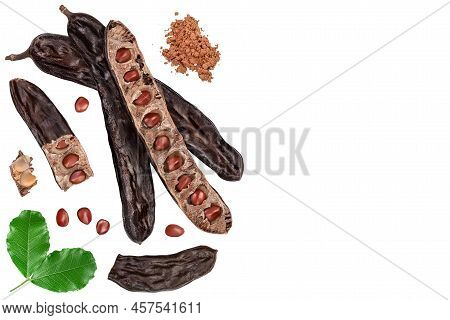 Ripe Carob Pods And Bean Isolated On White Background. Top View With Copy Space For Your Text. Flat 