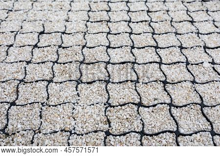 Geogrid Used At Base Of New Pedestrian Road, Road Construction, Reinforcement Covered With Fine Grav