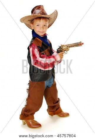 Fiú öltözött, mint egy cowboy