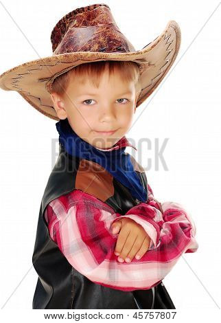 Fiú öltözött, mint egy cowboy