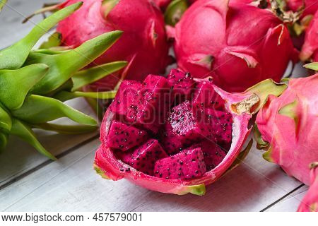 Dragon Fruit Slice On Fruit Peel With Pitahaya Background , Fresh Red Purple Dragon Fruit Tropical I