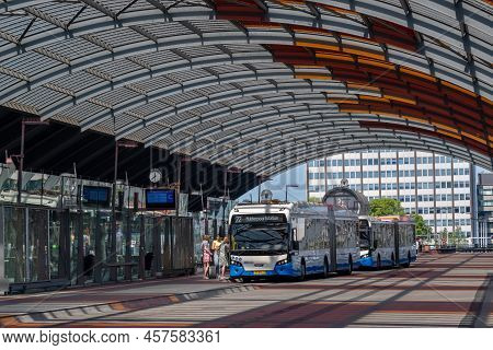 Amsterdam, The Netherlands - 21 June 2022: People Boarding A Gvb Bus At Amsterdam Central Station Bu