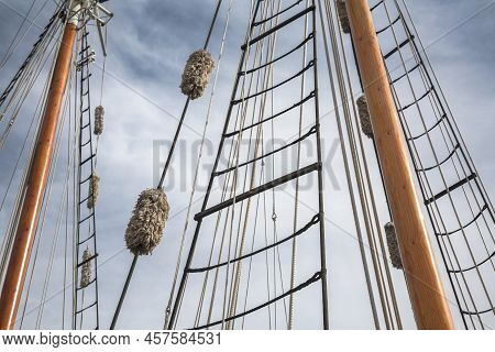 Rope Ladders Of The Antique Sailing Boat With The Sky On The Background