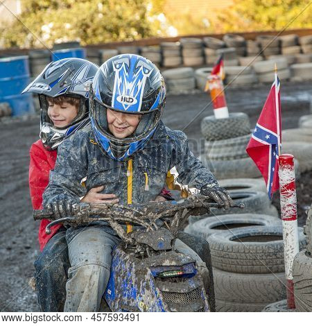 Schmitten, Germany - October 19, 2009: Children Love To Race With A Quad At The Muddy Quad Track.