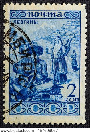 A Canceled Stamp Printed In The Ussr Shows Lezgins, People Of The Soviet Union, Circa 1933. Vintage 