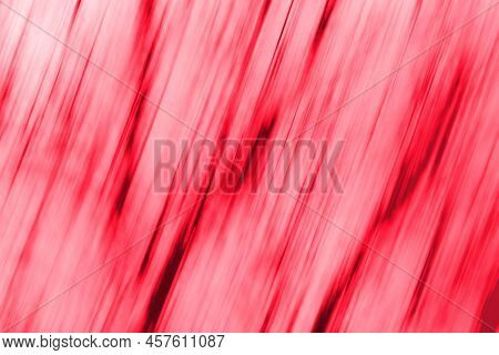Defocused Bokeh Poppy Red Background. Shining Purple Warm Red Background.