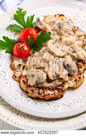 Cauliflower Steak With Mushrooms. Vegetarian Cuisine.