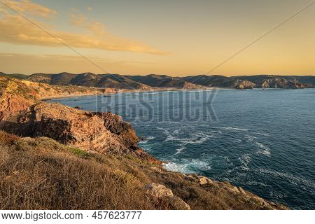 Sunset View To Beach With Rocks In Praia Do Amado In Algarve Portugal