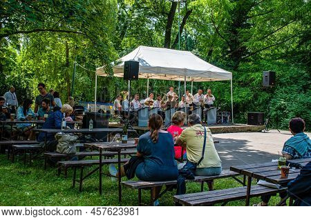 Straznice, Czech Republic - June 23, 2022 International Folklore Festival Audience Listens To Brass 