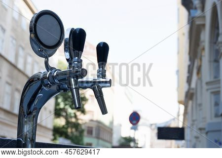 Close Up Of Double Tap Seen From Below For Serving Beer At Street Parties Festivals And Outdoor Even