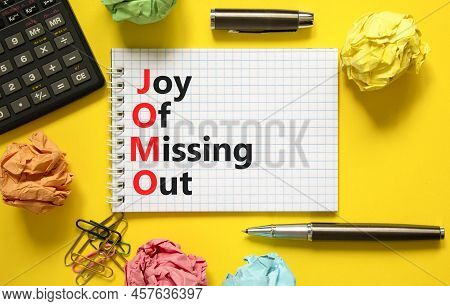 Jomo Joy Of Missing Out Symbol. Concept Words Jomo Joy Of Missing Out On White Note On A Beautiful Y