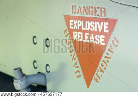 Danger Explosive Release, Aircraft Warning Decal Or Sign On An Old Jet Fighter Airplane