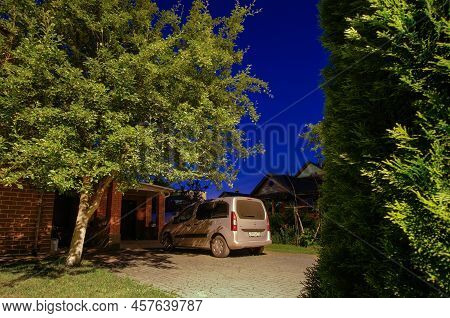 Moscow Region. Russia. July 2, 2022. Minivan Opel Combo Life In The Yard Of A Country House Among Th