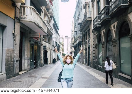 Happy Adult Woman In The Middle Of The Commercial Store Street In The City Give Up Arms For End Of C