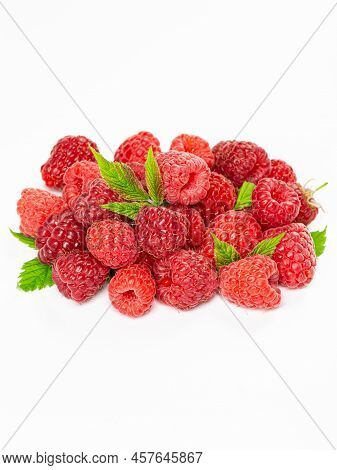 Ripe Raspberries With Leaf Isolated On A White Background