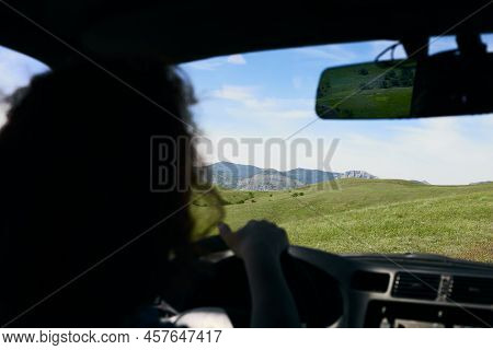 A Panorama Of Beautiful Green Hills. A Summer Landscape In The Crimea. View From A Car, Driven By A 