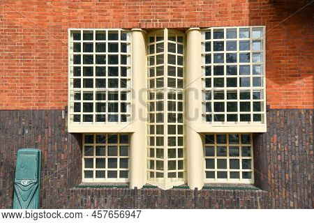 Amsterdam, Netherlands. June 2022. View Of The Facades Of The Characteristic Brick Building Of Resid