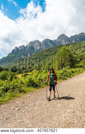A Young Woman On The Trekking To The Piedrafita Arch In The Pyrenees In Panticosa, Aragon
