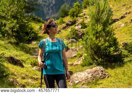 A Hiker On The Trek To The Piedrafita Arch In The Pyrenees In Panticosa, Aragon